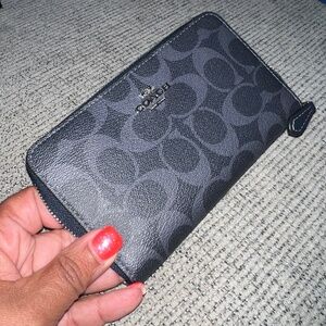 Navy coach wallet with silver hardware